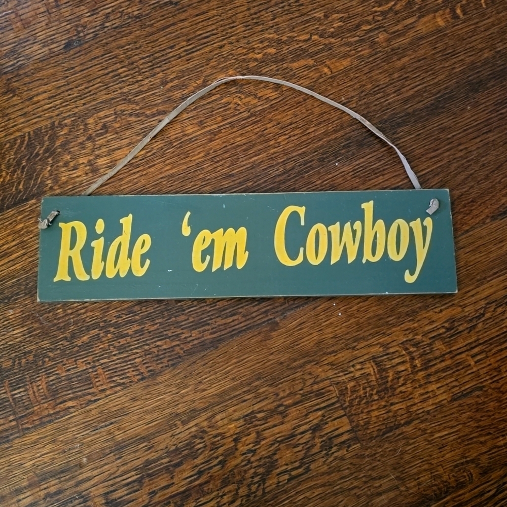 "Ride 'Em Cowboy" Sign